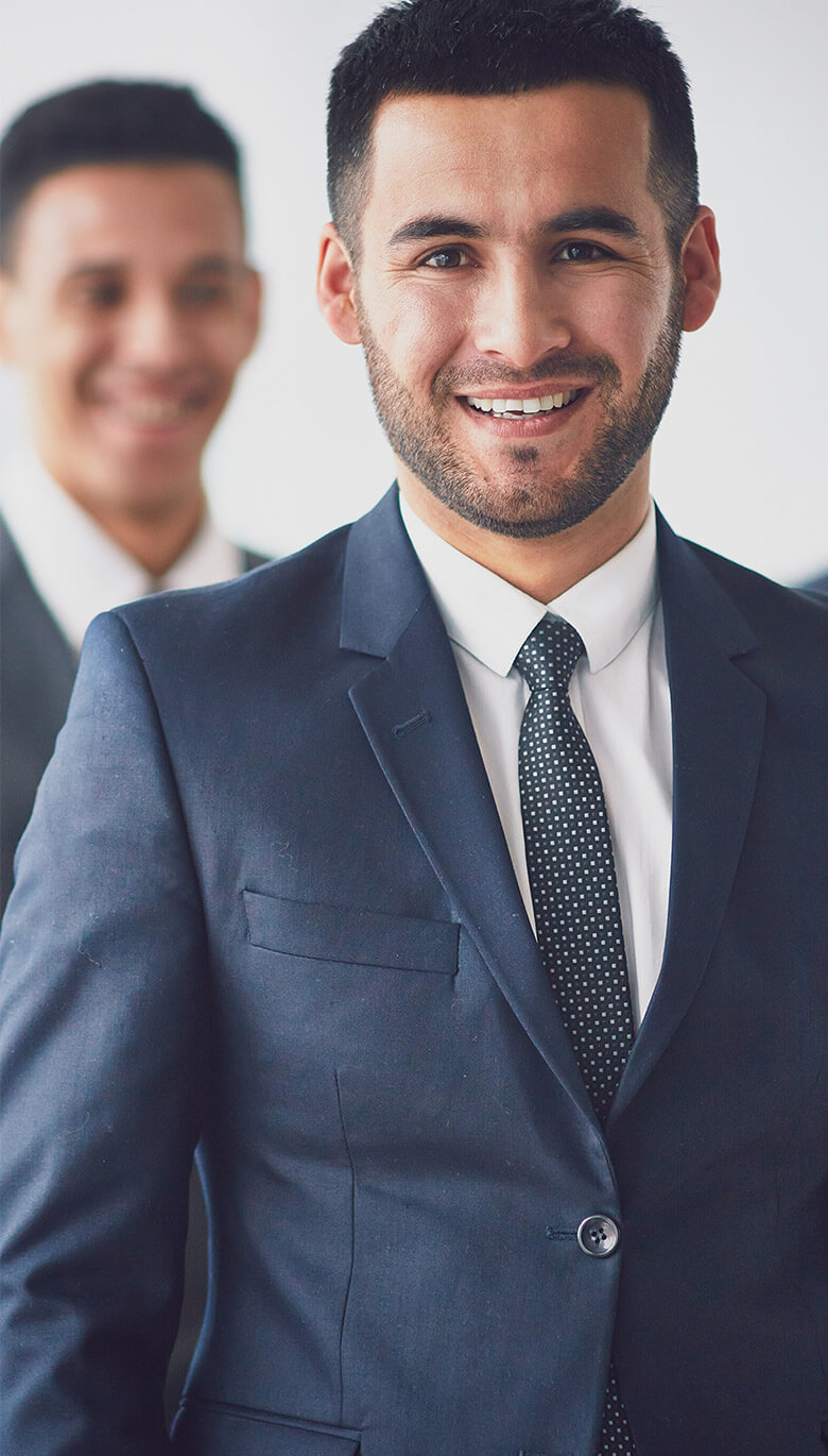 Businessmen smiling