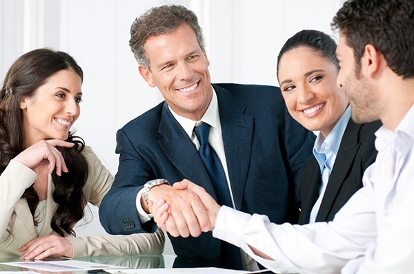 Business partners shaking hands